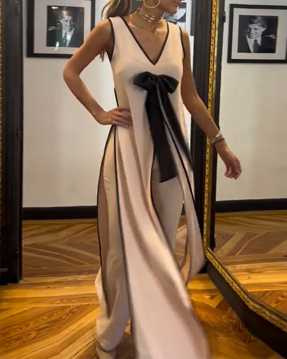 Elegant mouwloos pak in effen kleur met strik