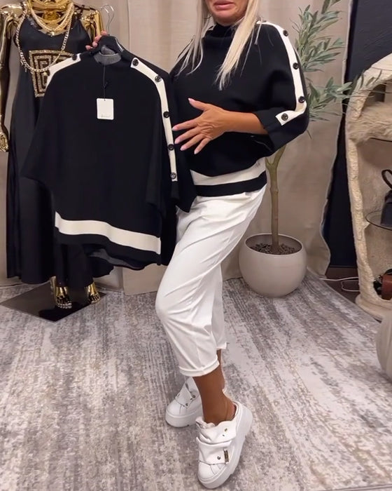 Pullover-trui met kleurblokken en knopen