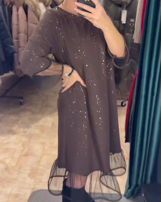 Stijlvolle jurk met ronde hals en glinsterende mesh