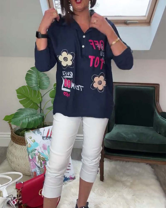 Casual top met capuchon en lange mouwen, geborduurd met bloemenletters