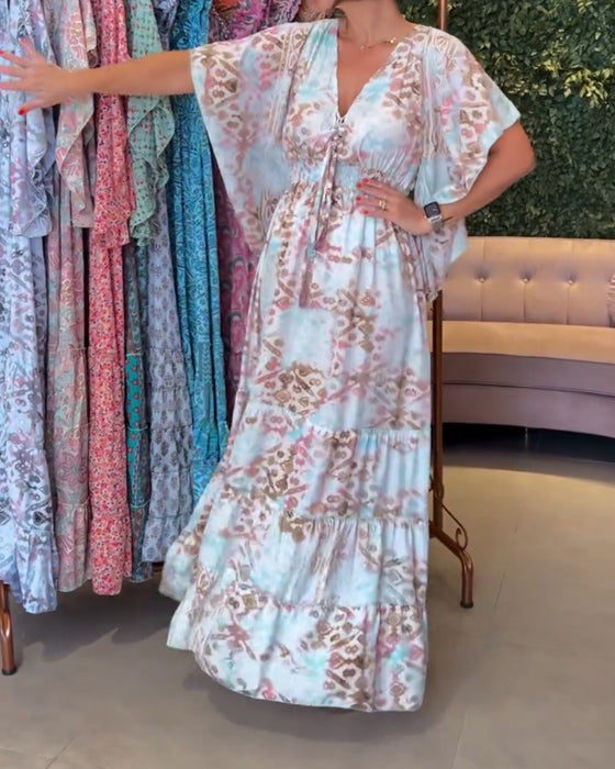 Lange jurk met V-hals en vlindermouwen met print