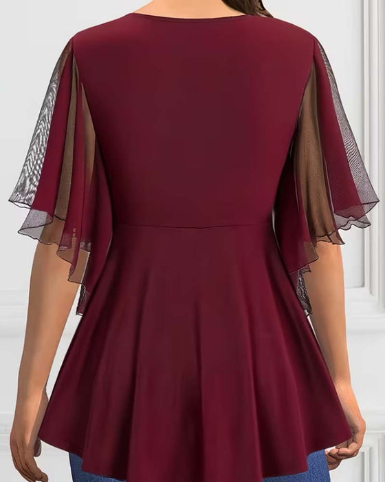 Effen V‑Hals Blouse