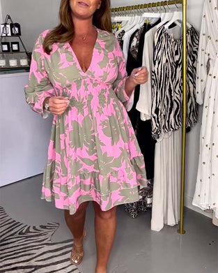 Jurk met diepe V-klokmouwen en bladprint