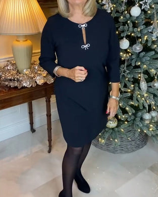 Eenvoudige effen jurk met ronde hals