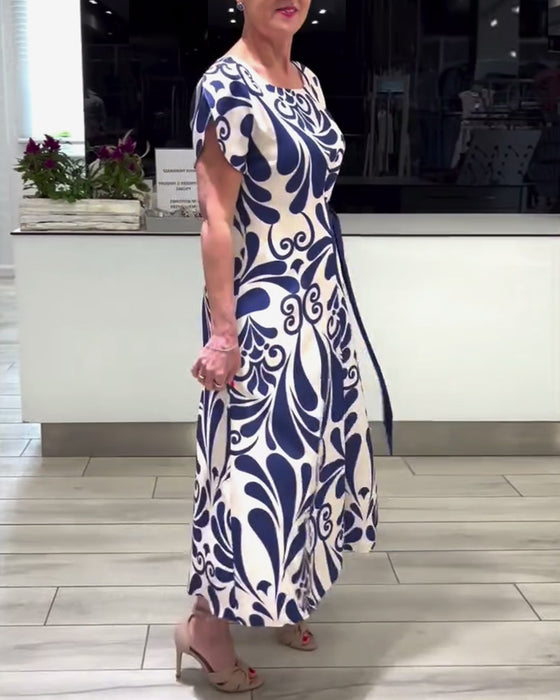 Elegante jurk met korte mouwen en contrastprint