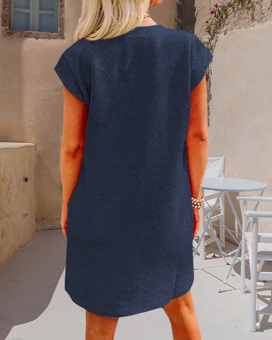 Jurk met ronde hals, zak en korte mouwen