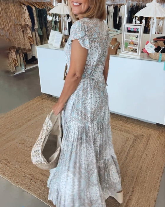 Jurk met V-hals en splitmouwen met vakantieprint