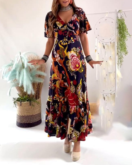 Elegante jurk met V-hals en korte mouwen met print