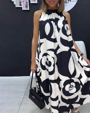 Mouwloze elegante jurk met print