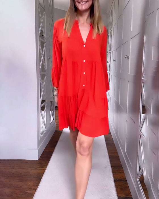 Effen kleur uitlopende patchworkjurk met lange mouwen en V-hals