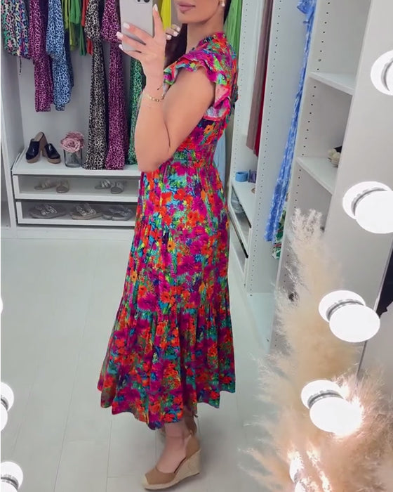 Elegante jurk met kleurrijke bloemenprint en V-hals