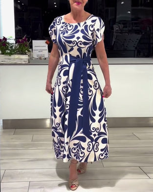 Elegante jurk met korte mouwen en contrastprint