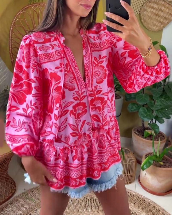 Diepe V-blouse met bloemenprint