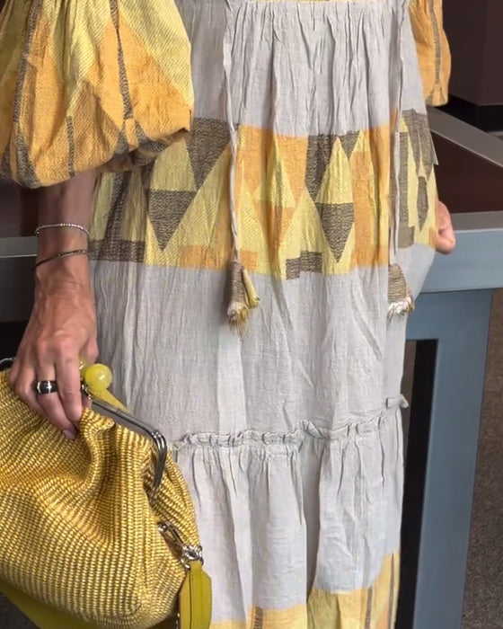 Losse jurk met print, klokmouwen en V-hals