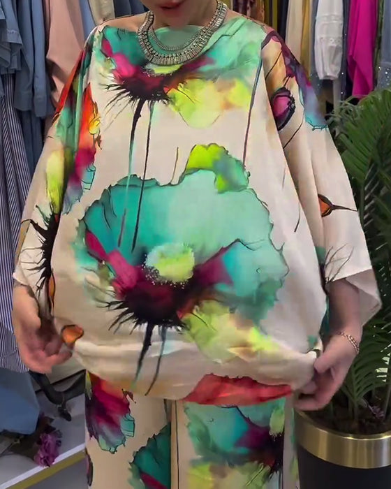 Set met driekwart mouwen met lotusprint en één schouder