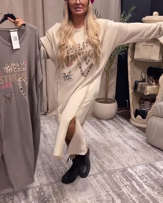 Losse jurk met lange mouwen en print