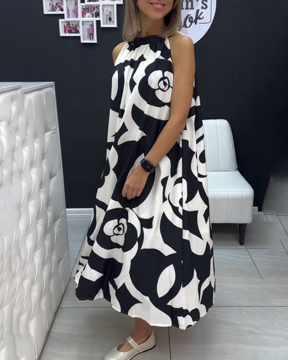 Mouwloze elegante jurk met print