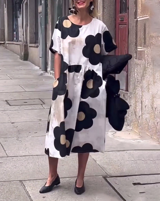 Losse jurk met bloemenprint, ronde hals en zak