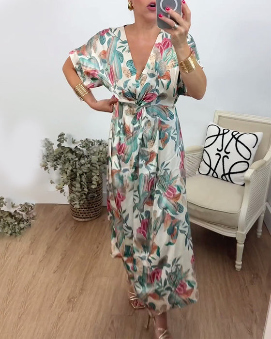 Elegante jurk met v-hals en botanische print