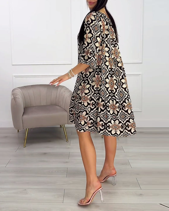 Jurk met vintage print tot op de knie