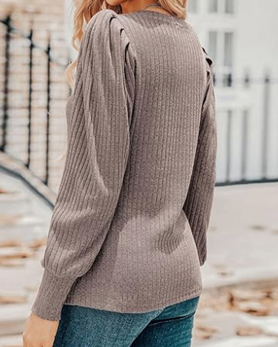 Effen top met lange mouwen en V-hals