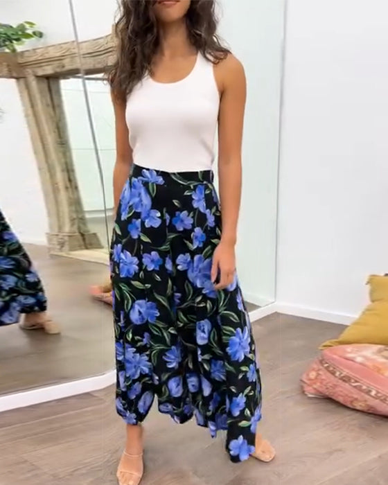 Broek met hoge taille en wijde pijpen met bloemenprint