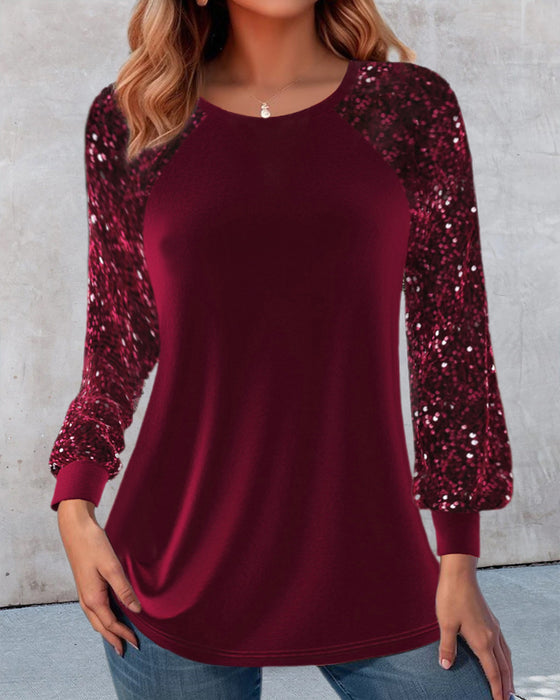 Casual effen gekleurde top met ronde hals en pailletten en lantaarnmouwen