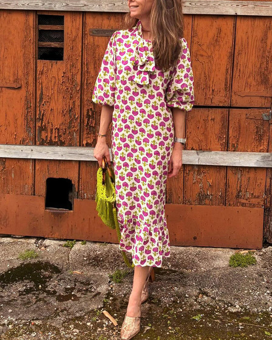 Elegante jurk met pofmouwen en print