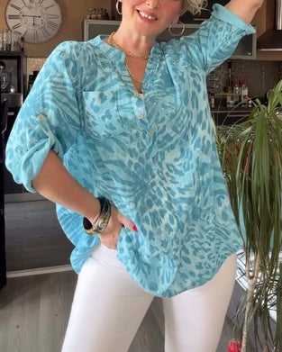 Bedrukte blouse met V-hals, zak met knopen en driekwart mouwen