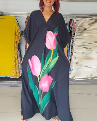 Lange jurk met split en V-hals met bloemenprint