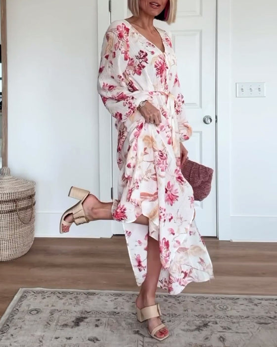 Elegante veterjurk met bloemenprint en klokmouwen