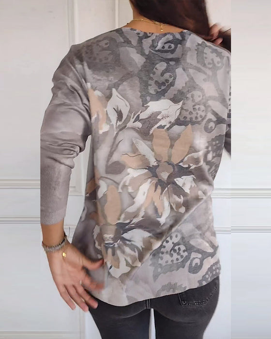 Vintage top met V-hals en lange mouwen met bloemenprint