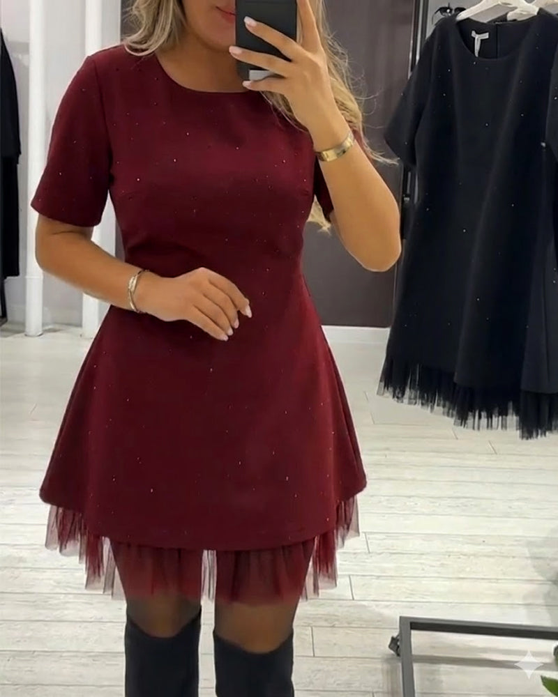 Elegante jurk met glinsterende mesh-patchwork