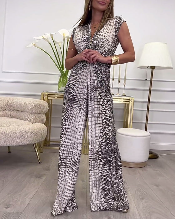 Mouwloze jumpsuit met diepe V-twistprint