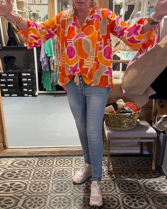 Blouse met kleurrijke en vallende schouders