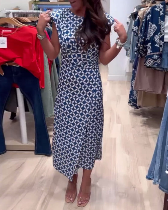 Mouwloze, elegante jurk met geometrische print en ronde hals