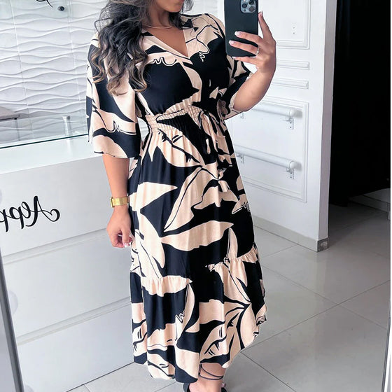 Elegante jurk met V-hals, driekwart mouw en trekkoord