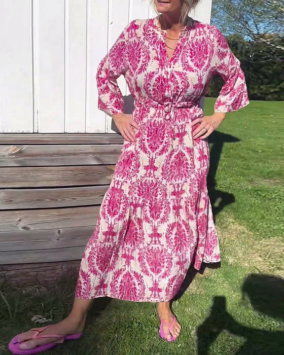 Jurk met trekkoord en klokmouwen met print