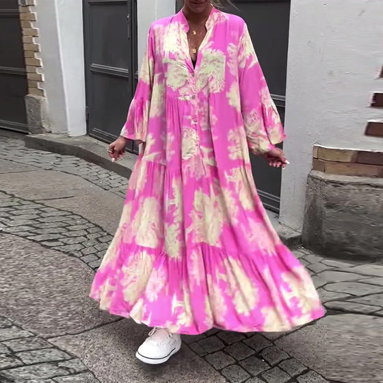 Losvallende patchworkjurk met V-hals en klokmouwen met print