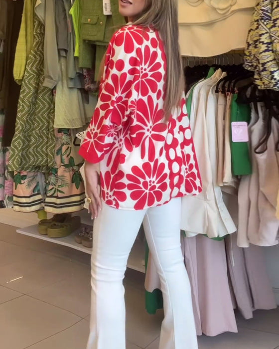 Bloemenblouse met onregelmatige zoom en revers