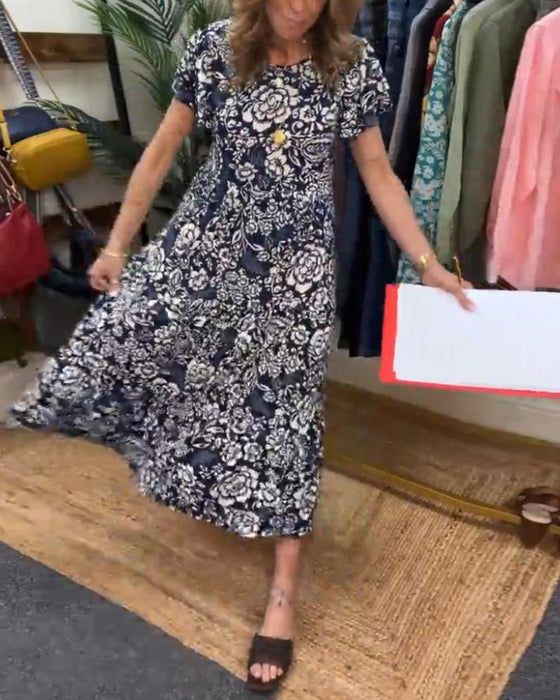 Lange jurk met bloemenprint en korte mouwen