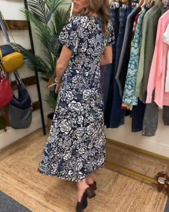 Lange jurk met bloemenprint en korte mouwen