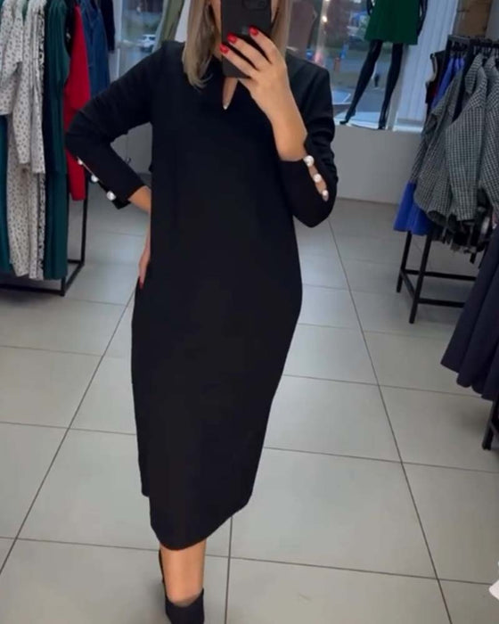 Elegante jurk met parelknopen