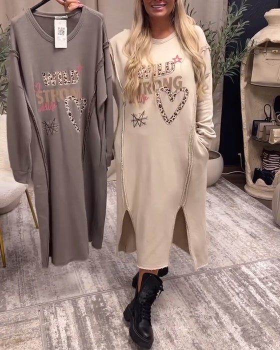 Losse jurk met lange mouwen en print