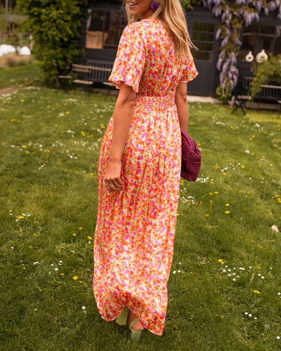 Getailleerde bloemenjurk met V-hals