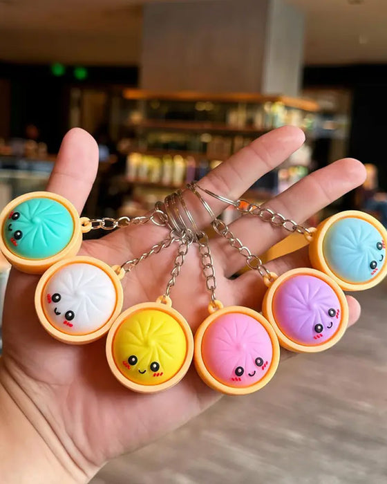 Schattig Dumpling Drukbaar Gloed Squishies Fidget Sleutelhanger
