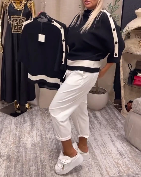 Pullover-trui met kleurblokken en knopen