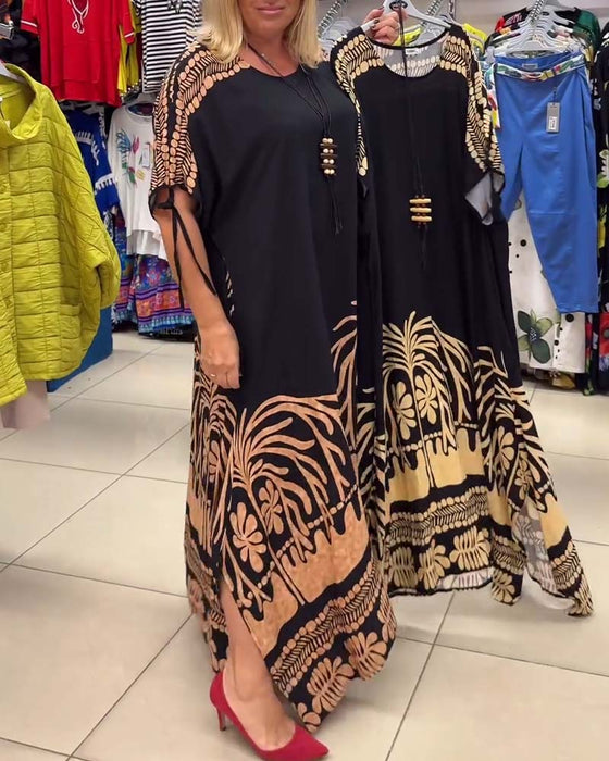 Losse jurk met ronde hals, korte mouwen en veters met print