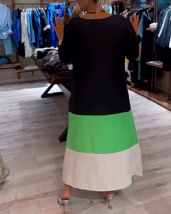 Losse patchworkjurk met ronde hals en kleurenprint