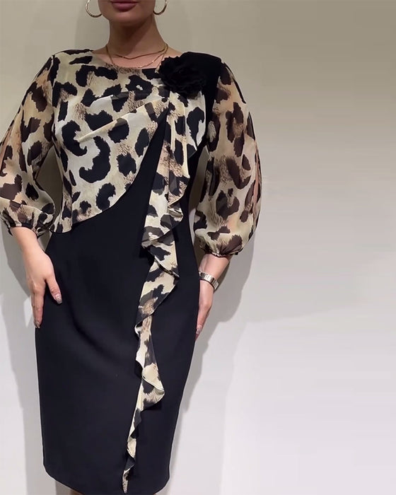 Elegante patchworkjurk met luipaardprint